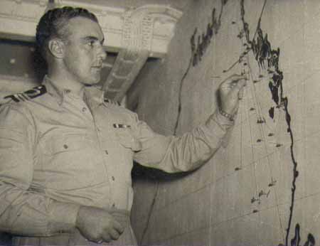 Cmdr Ron Ashby studying the Arakan coast.   
    Photo from the Ashby Collection ©