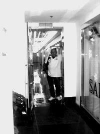 The author in Admiral Chan Chak's former office with his son on the 4th floor of the Pedder Building