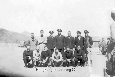 Lt Ashby with officers & ratings at  Tuyunguan Red Cross Centre.
      Run the curser over to identify individuals       
      Photo from the Hide collection ©