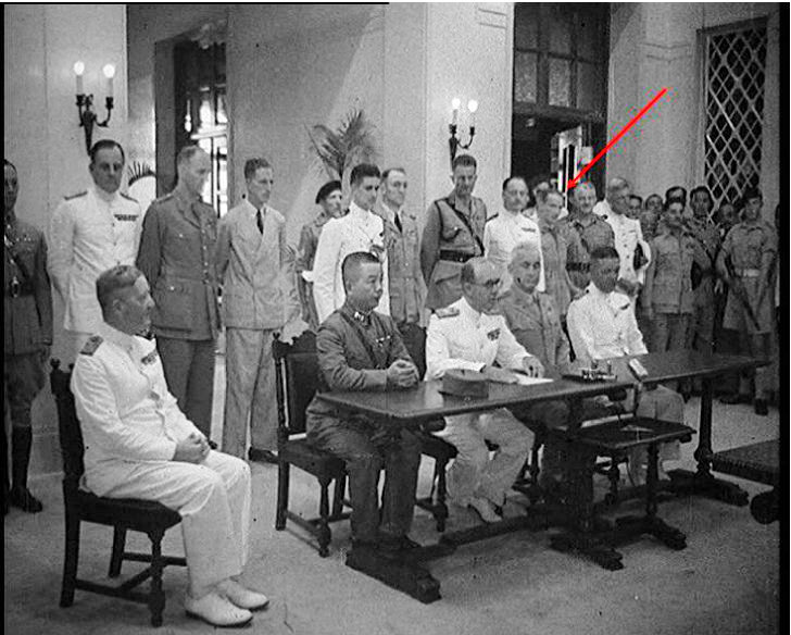 Brigadier Colonial Secretary David MacDougall witnesses the Japanese surrender in Government House 