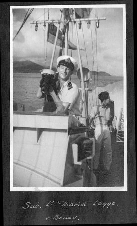 Sub-Lt Legge with the ships dog on MTB 11.  
	Photo from the Hide collection ©