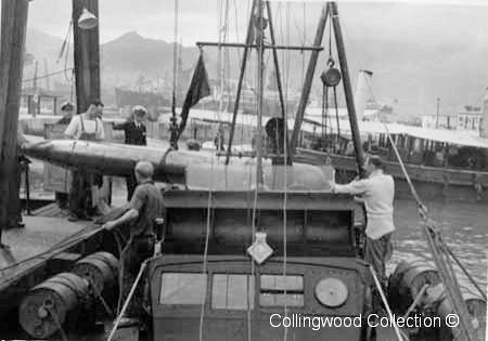 MTB 11 loading the torpedos in Kowloon MTB 11 loading the torpedos in Kowloon