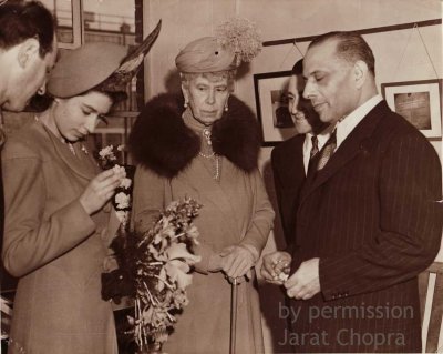 HRH Queen Mary and Princess Elizabeth along with Iqbal Chopra KC inspecting the Williamson Pink during it's cutting and polishing at the Clerkenwell premises on 10 March 1948.
	Photo from the Chopra family collection ©